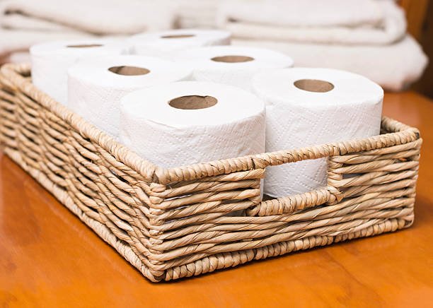 Toilet paper rolls on wicker basket