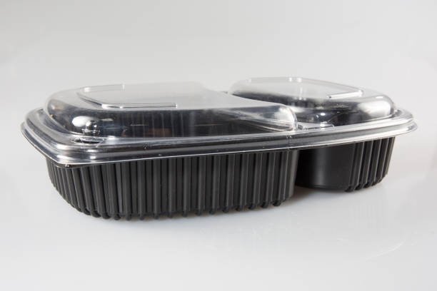 plastic package with a black lid and a clear lid for food